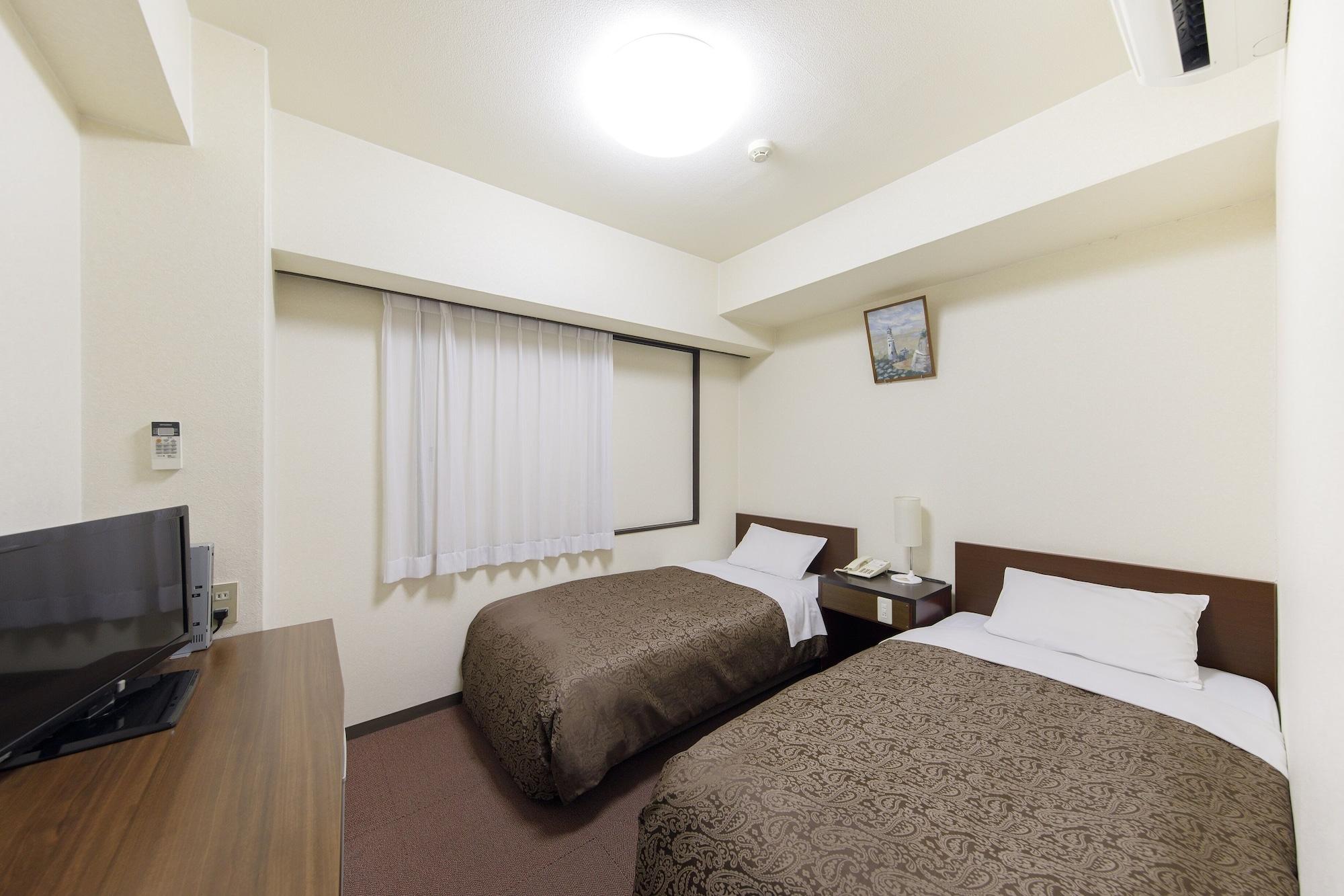 Dai-Ni Sunny Stone Hotel Суйта Экстерьер фото