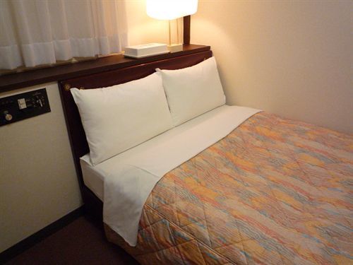 Dai-Ni Sunny Stone Hotel Суйта Экстерьер фото