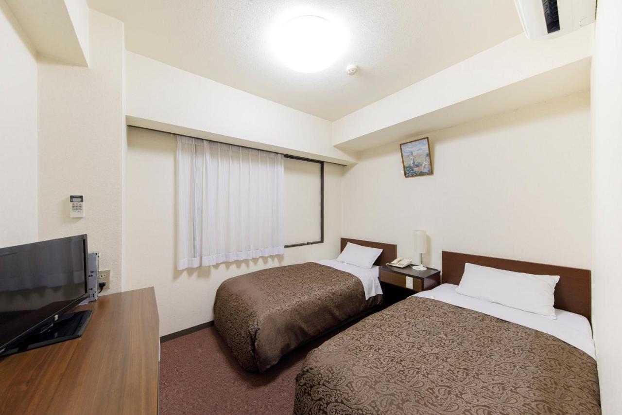 Dai-Ni Sunny Stone Hotel Суйта Экстерьер фото